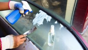 removing paint from car window